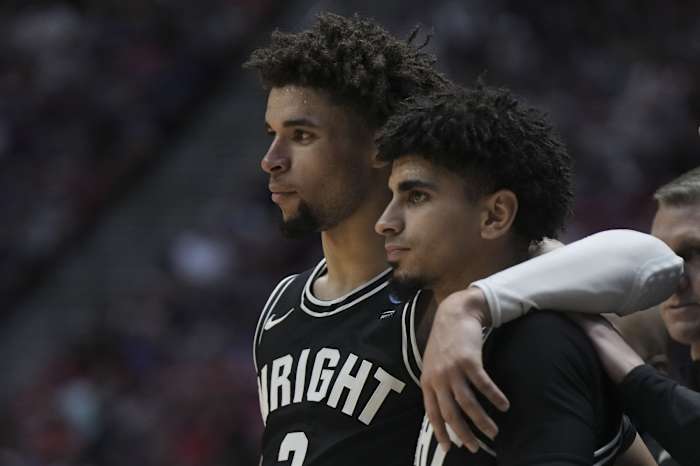 Wright State Raiders guard Tanner Holden (2) and guard Trey Calvin (1) react against the Arizona Wildcats during the second half during the first round of the 2022 NCAA Tournament at Viejas Arena.